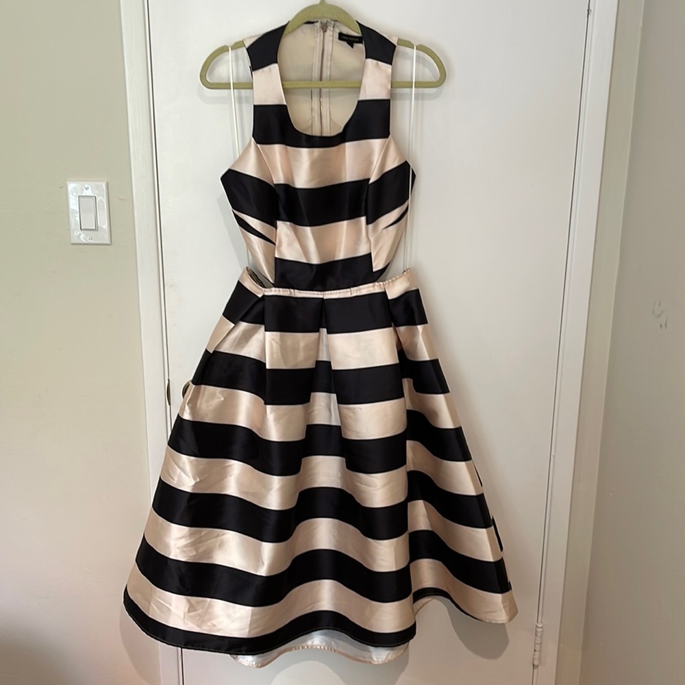 Miss Avenue black and ivory striped a line dress with cut out detail